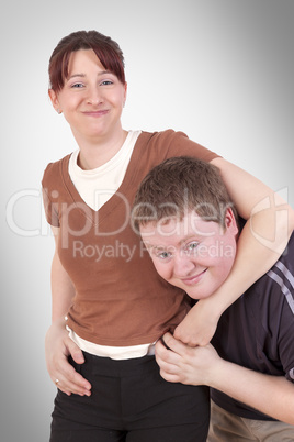 woman holding man in a headlock