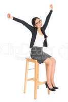 happy asian girl sitting on a chair