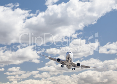 Jet Airplane Landing with Dramatic Clouds Behind