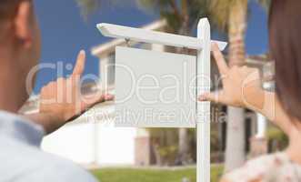 Blank Real Estate Sign, House and Military Couple Framing Hands