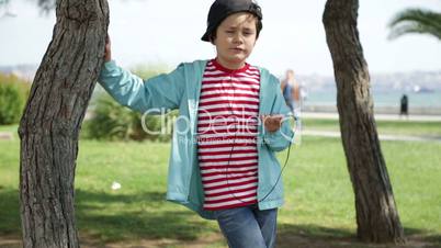 Child listening to music and dancing