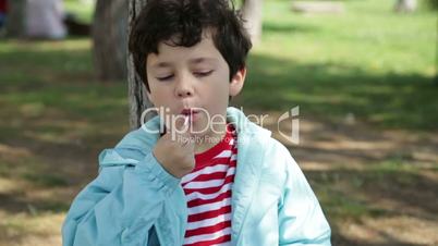 child with lollipop