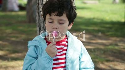 child with lollipop
