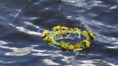 A wreath of flowers on the water
