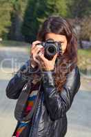 Girl with DSLR camera