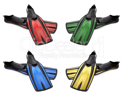 Set of multicolored flippers for diving with water drops