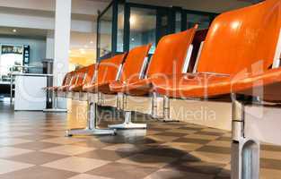 Airport gate empty chairs