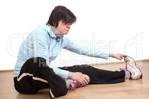 Woman with stretching before exercise