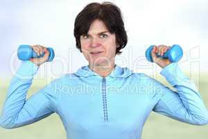 Woman with dumbbells during sport
