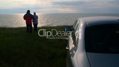 Couple traveling to the sea shore by car