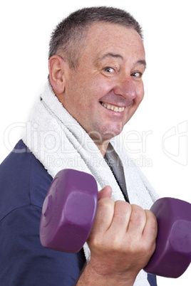 Elderly man with dumbbells during sport