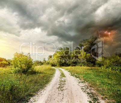 Country road and thunderstorm