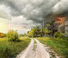Country road and thunderstorm