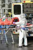 HAZMAT medical team member with stretcher