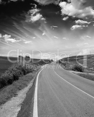 Countryside Road in Tuscany with Cloudy and Colorful Sky