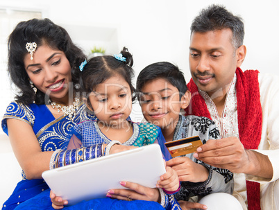 indian asian family online shopping with credit card