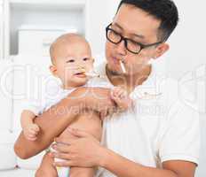 daddy and baby with cigarette