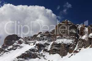 Rocks and blue sky with clouds