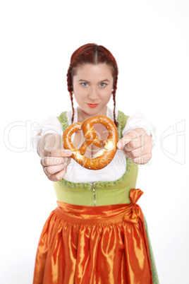 Young red head woman in traditional bavarian costume
