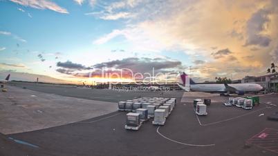 airplane time lapse at gate departing sunset