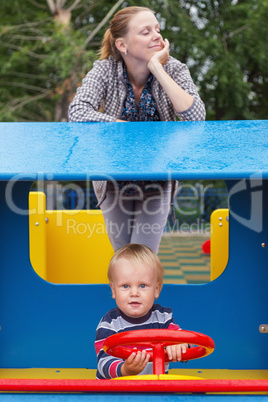 Mother and son on playground