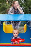 Mother and son on playground