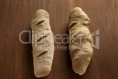 baked bread loaf on wood