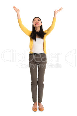 asian woman holding something from high
