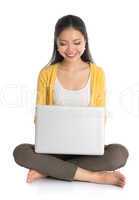 asian girl using laptop pc