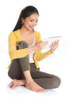asian girl using tablet computer
