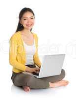 asian girl using notebook computer