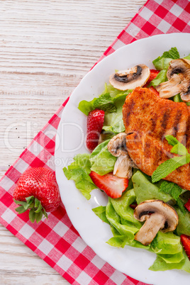 steak with green salad