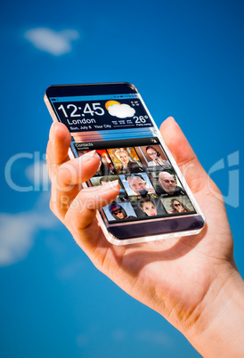 Smartphone with transparent screen in human hands.