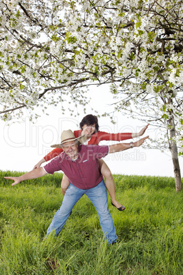 Mature couple has fun at the Cherry Blossom