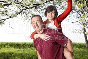 Mature couple has fun at the Cherry Blossom