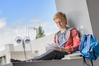 Student boy studying at university campus