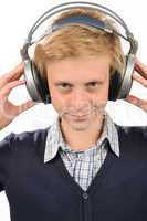 Confident teenage boy listening to music