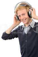 Happy teenage boy wear headphones