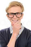 Happy teenage nerd boy wearing geek glasses