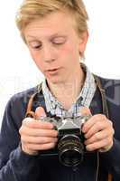 Teenage boy using retro camera