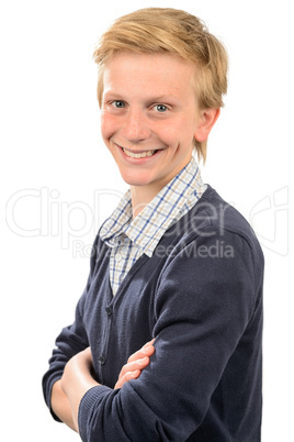 Happy teenage boy standing arms crossed