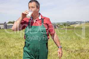 Farmer with glass of milk before his court