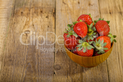 fresh strawberries in wood bowl