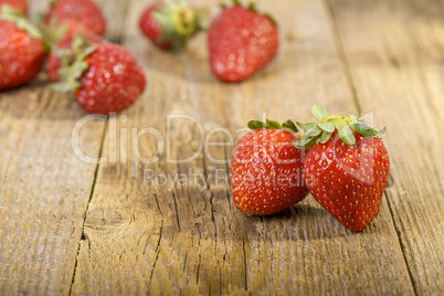 fresh strawberries on wooden table