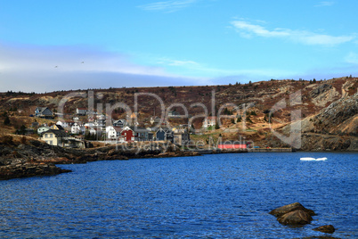 Brigus Cove Newfoundland, part of village and junks of Iceberg