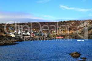 Brigus Cove Newfoundland, part of village and junks of Iceberg