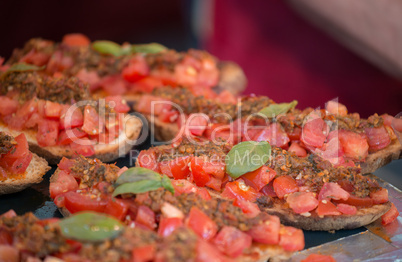 Tasty Bruschetta. Garlic Bread, Tomatoes and Olive Oil