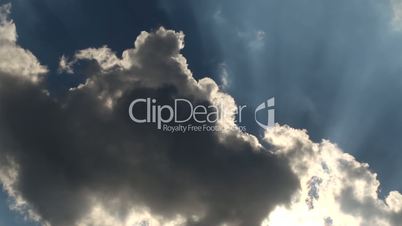 Time lapse of  clouds over blue sky