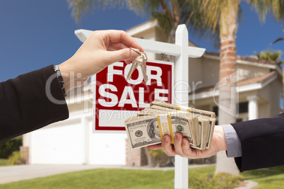 Agent Handing Over Keys, Buyer Handing Over Cash for House