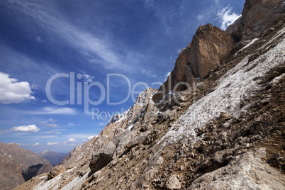 Rocks with snow at sun day